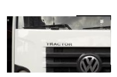 EMBLEMA VW CONST TRACTOR PLASTICO FRONTAL